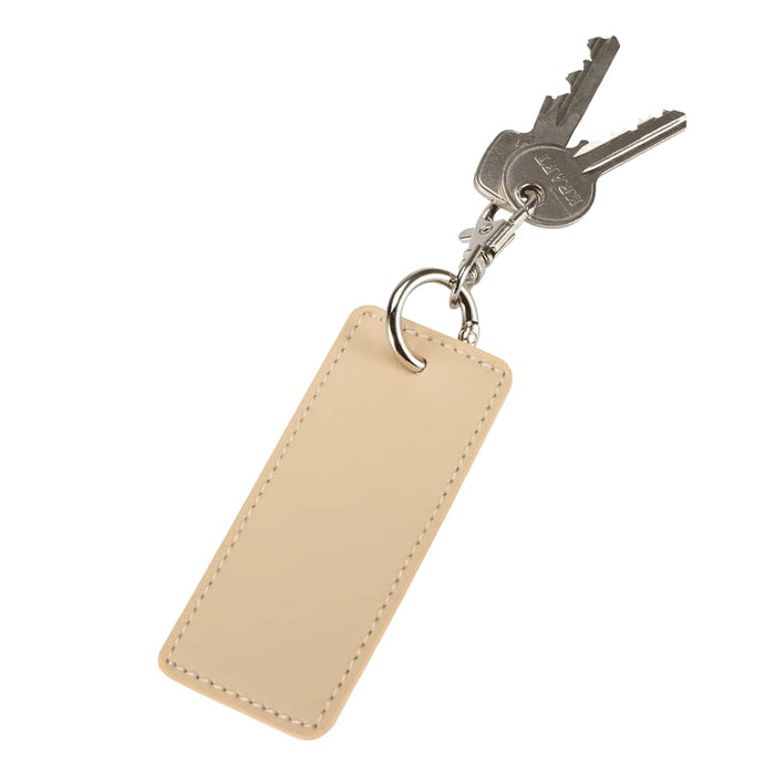 Resi Plus Rectangle Keychain - A rectangle keychain in beige with a small metal ring attached to keys. It has a logo on the keychain.