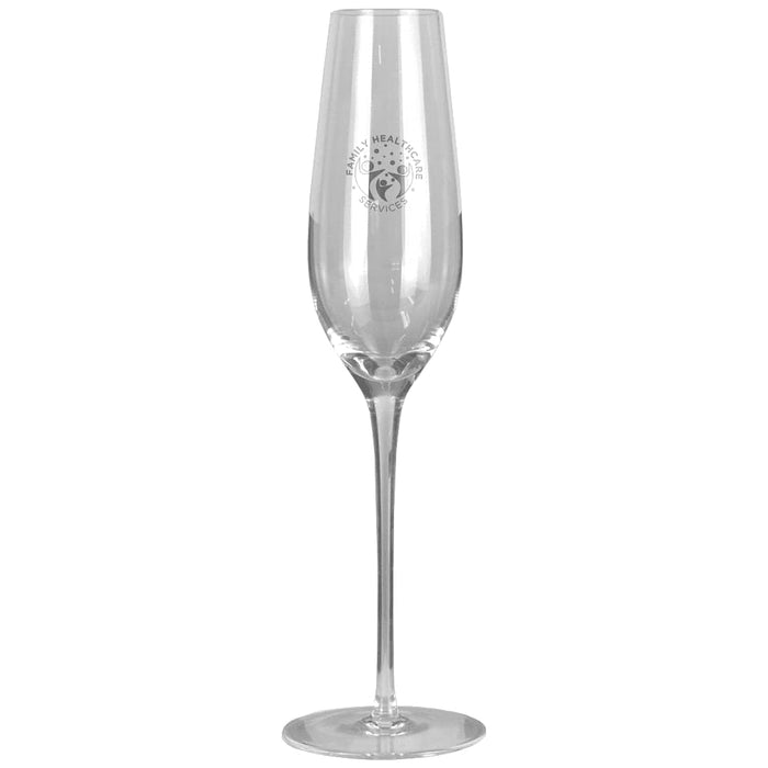 Champagne Flute - A clear glass champagne flute with a tall, slender design and a circular base, featuring a logo.