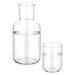 Amelie Glass Carafe & Cup Set 850ml - A glass carafe and matching cup set in clear glass, filled with water. The carafe features a logo.