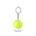 Tennis Ball Keyring - A yellow tennis ball keyring with a silver metal chain, measuring 4cm in diameter.