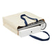 Heavy Duty Canvas Tote with Gusset - A cream heavy-duty canvas tote with navy handles, filled with various items including books and a box.