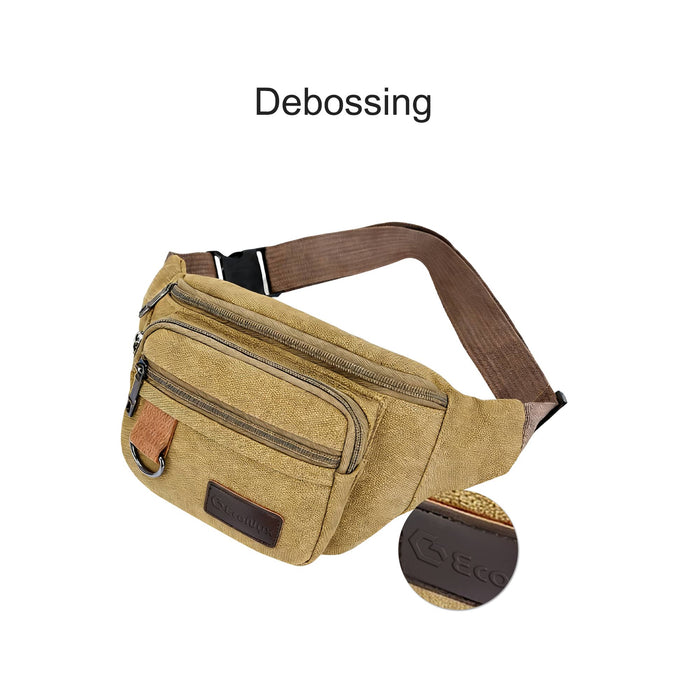 Canvas Waist Bag - A mustard-coloured canvas waist bag featuring a front zip pocket and a brown strap. It includes a logo detail.