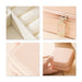 PU Leather Jewellery Box - A pink PU leather jewellery box featuring sections for organisation, a secure zipper, and a smooth exterior.