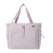 Lightweight Tennis Tote Bag - A lightweight tote bag in soft lavender with multiple pockets and a strap. Features a simple logo on the front.