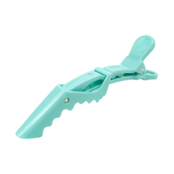 Anti-Slip Positioning Alligator Clip - A turquoise alligator clip with an anti-slip grip feature and a textured top for secure holding.