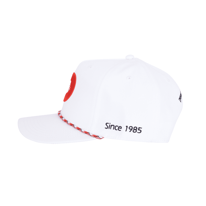 Heritage 5 Panel Polyester Cap with Custom Braid - A white 5 panel polyester cap featuring a custom braid and a logo, with the text "Since 1985" on the side.