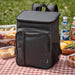 Tundra GRS RPET Picnic Cooler Backpack w/ Cutlery Set 20L - A grey picnic cooler backpack with a front pocket, beside containers of food and drinks on a picnic blanket.