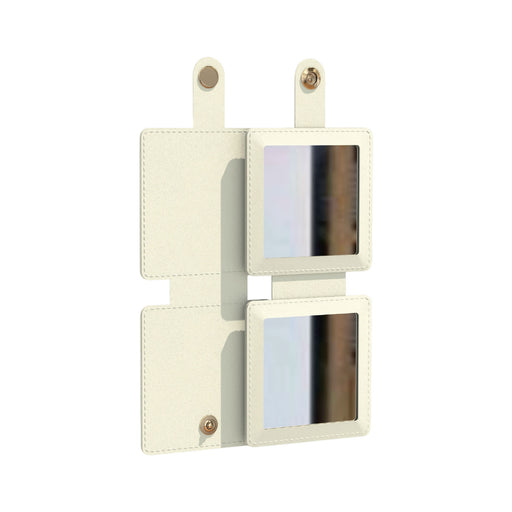 Suqare Folding Pocket Mirror - A square folding pocket mirror in cream, featuring two reflective surfaces and a logo.