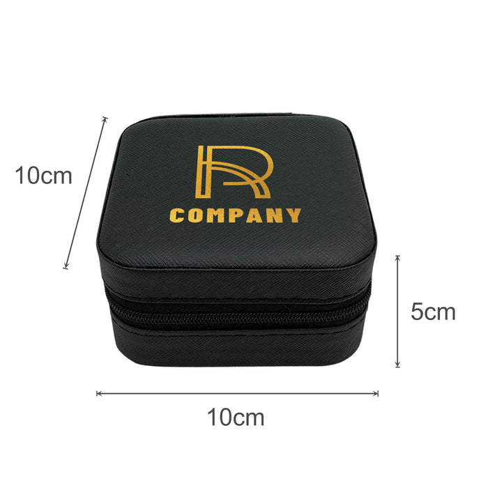 PU Leather Jewellery Box - A black PU leather jewellery box with a zipper, featuring a logo on the top. Dimensions are 10cm x 10cm x 5cm.