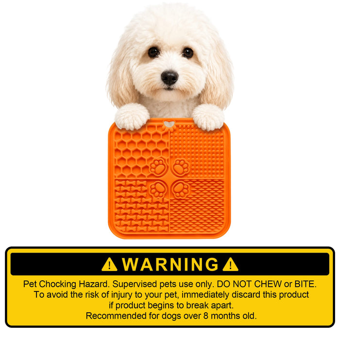 4-Section Dog Enrichment Lick Mat - An orange 4-section lick mat with various textures held by a fluffy dog, featuring a warning label at the bottom.