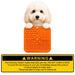 4-Section Dog Enrichment Lick Mat - An orange 4-section lick mat with various textures held by a fluffy dog, featuring a warning label at the bottom.