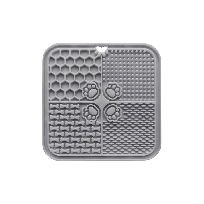 4-Section Dog Enrichment Lick Mat - A grey, silicone 4-section dog enrichment lick mat with various textured patterns and a heart-shaped hole.