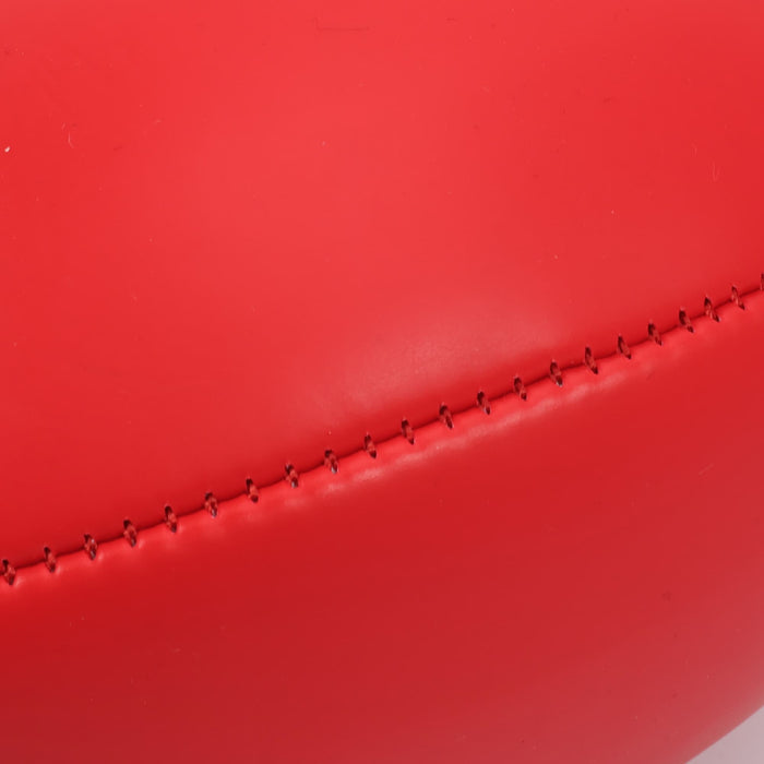 Mini Promotional Aussie Rules Ball - A red mini promotional Aussie Rules ball with visible stitching detail. It features a branding logo.