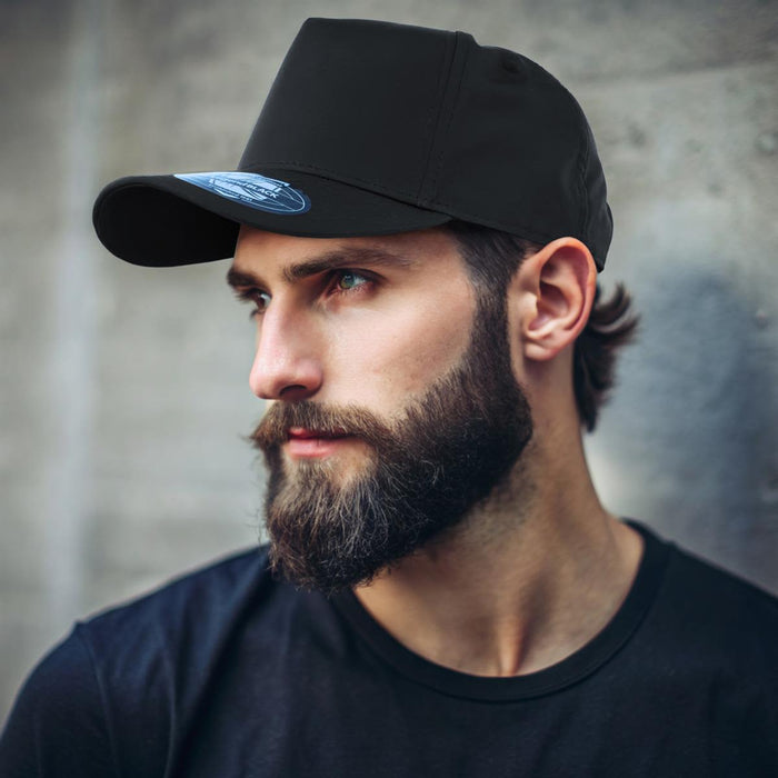 A-Frame Sport - A black cap with a curved brim is worn by a man with a beard, featuring a logo on the front.