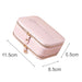 Fashion PU Leather Jewellery Case with Mirror - A pink PU leather jewellery case with a mirror, featuring dual zippers and a logo on the lid. Dimensions provided.