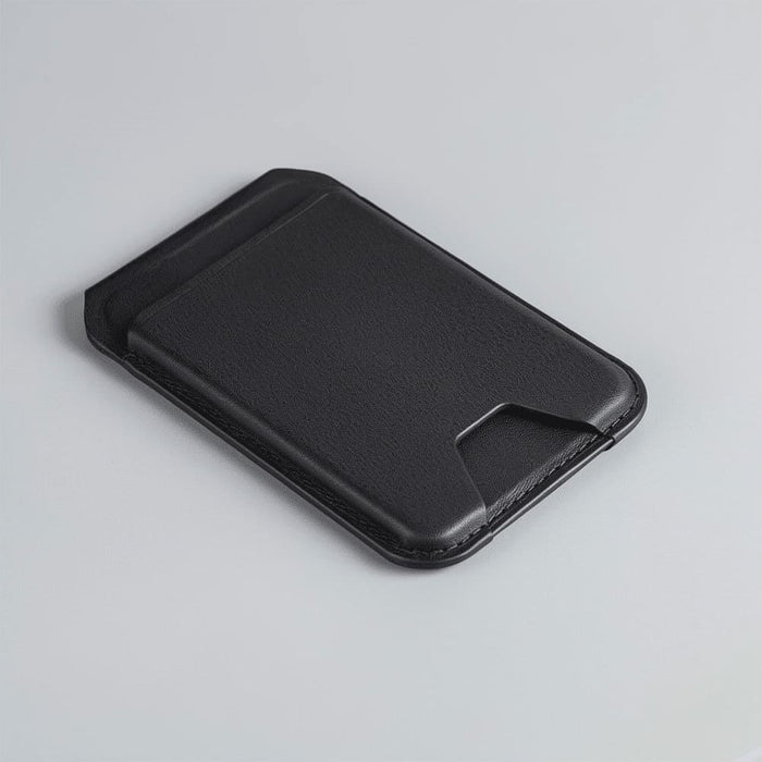 Magnetic Wallet w/ Phone Stand - A black magnetic wallet with a slim design, featuring a phone stand and a branding logo on the surface.