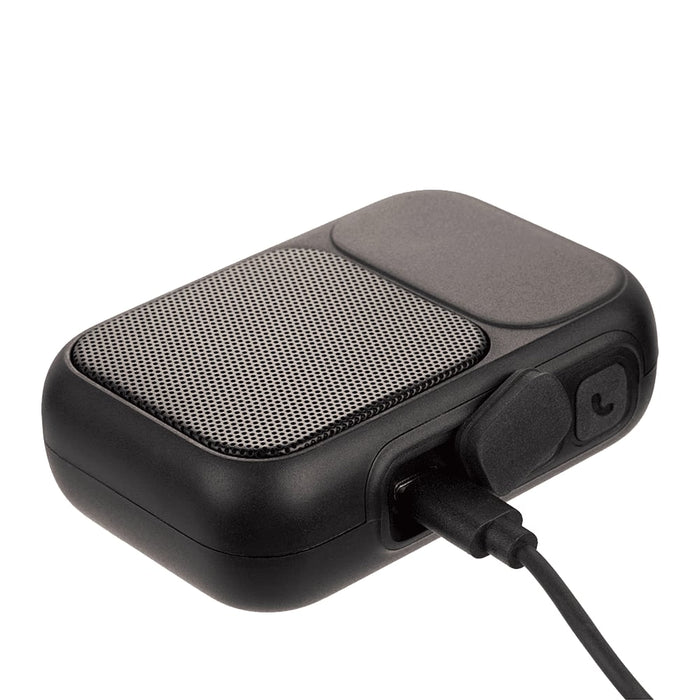 Clip Tune Magnetic Outdoor Bluetooth Speaker - A black Bluetooth speaker with a textured grille and charging port, featuring a sleek, compact design.