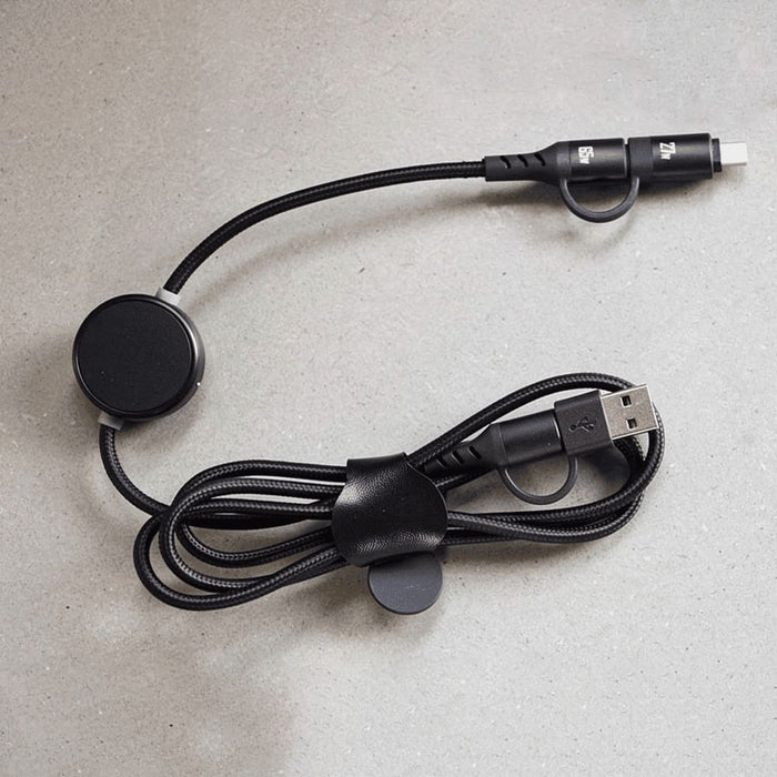 Night Mode Fast Charging Data Cable - A black charging data cable with a unique design, featuring a circular attachment and a sturdy braided cord.