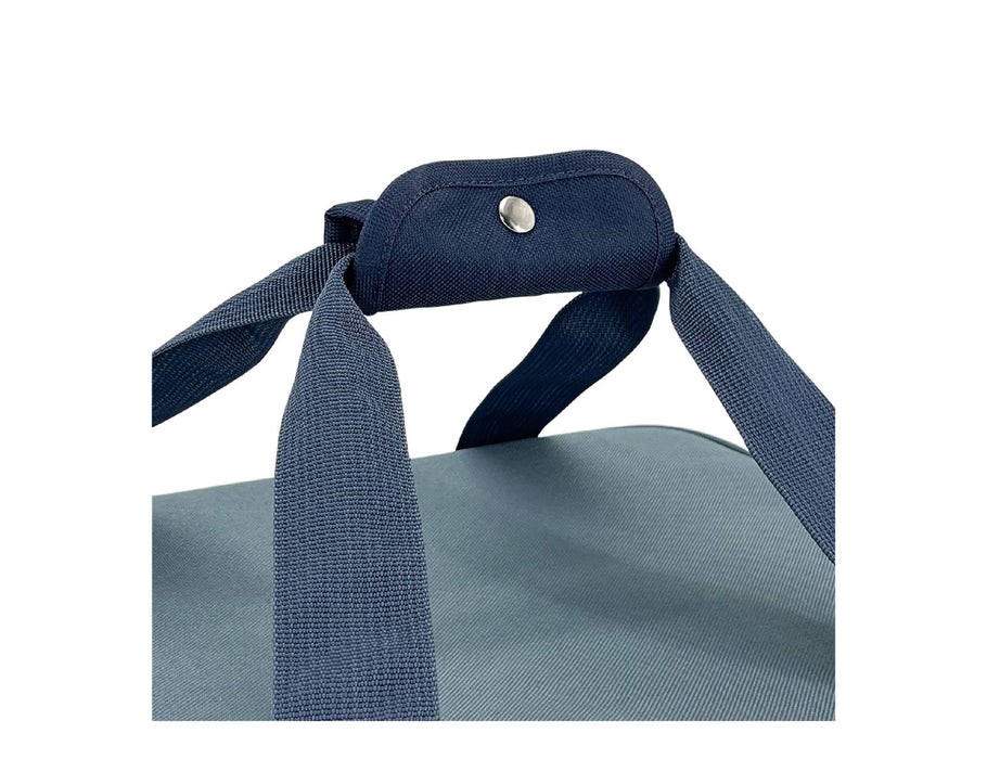 Sachi Insulated 'Cook & Carry' Bag - A blue insulated carry bag with sturdy straps and a snap button closure on the handle.
