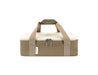 Sachi Insulated 'Cook & Carry' Bag - A beige and khaki insulated bag with a zip closure and dual handles, featuring a logo on the side.