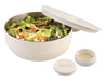 Oasis 950ml Insulated Fresh'N'Go Lunch Bowl - A salad bowl in cream colour with a lid, featuring fresh salad and a small container for dressing. It has a logo.