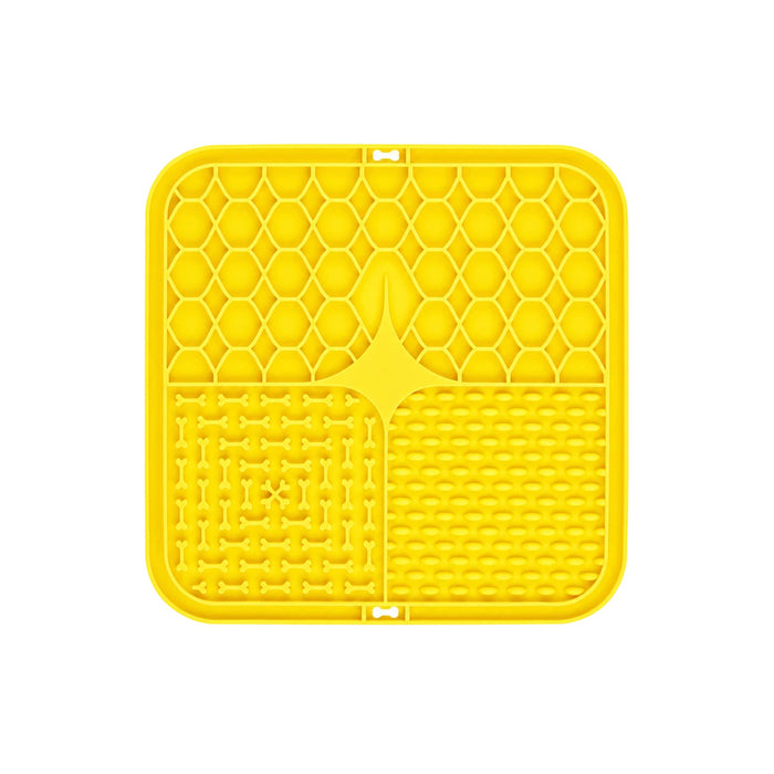 3-Section Dog Enrichment Lick Mat - A yellow, three-section dog enrichment lick mat with honeycomb, bone, and textured patterns. It features a logo.
