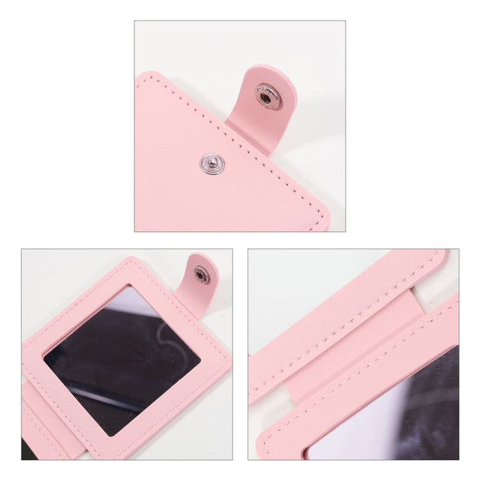 Suqare Folding Pocket Mirror - A pink square folding pocket mirror with a snap closure and a reflective surface, featuring stitching details.