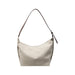Dumpling Canvas Tote Bag - A cream-coloured tote bag with a brown shoulder strap and a smooth finish. It features a simple design and has a logo.