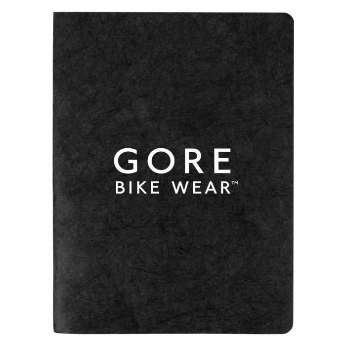 Koda Survival Notebook (Blank Pages) - A black notebook with a textured cover featuring a logo. It has a smooth finish and blank pages inside.