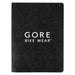 Koda Survival Notebook (Blank Pages) - A black notebook with a textured cover featuring a logo. It has a smooth finish and blank pages inside.