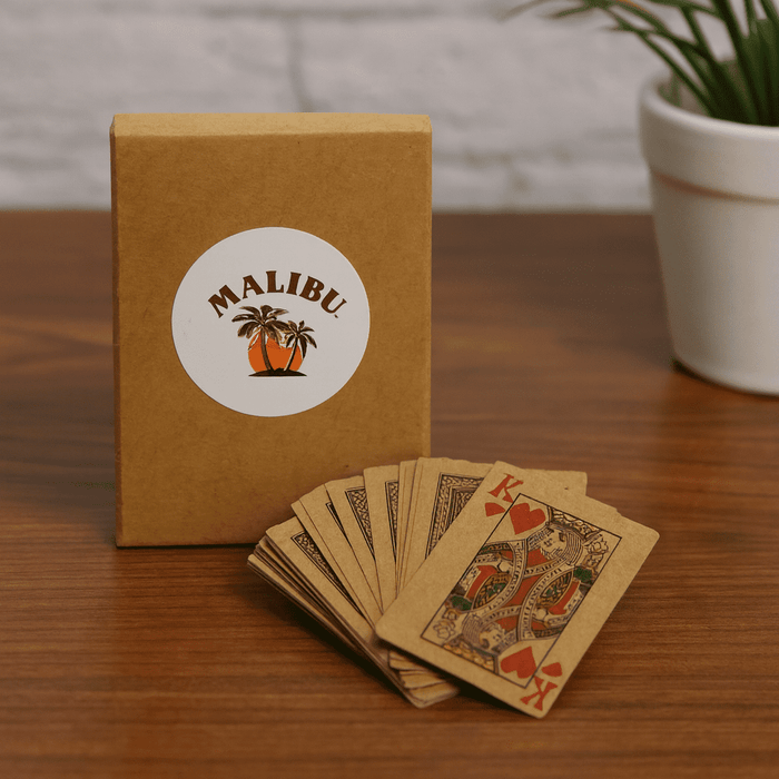 Eco Playing Cards - A set of eco-friendly playing cards in a brown box with a logo, featuring intricate designs in earthy tones.