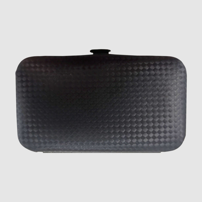 Mall Manicure set - A black manicure set case with a textured surface, featuring a secure closure and compact design.