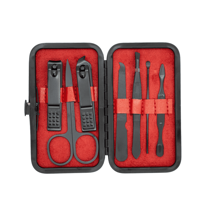 Mall Manicure set - A black manicure set with red lining, featuring scissors, clippers, and various grooming tools in a compact case.
