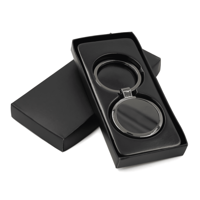 Anello Gunmetal Keychain - A gunmetal keychain presented in a black gift box, featuring a sleek, circular design.
