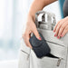 Sherry 15W Foldable 3-in-1 Magnetic Wireless Charger - A black foldable 3-in-1 magnetic wireless charger being placed into a grey bag with dual handles.