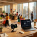 Everest 3-in-1 15W Magnetic Wireless Charging Station - A modern, sleek 3-in-1 charging station in black, with a watch, earbuds, and a laptop, set in a vibrant office environment.