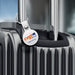 MiTag Duo Global Tracking Tag with PU Case (stock) - A black suitcase with a silver handle featuring a round tag with a logo.