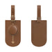 MiTag Duo Tracker Luggage Tag - A brown luggage tag with a smooth circular attachment, featuring a subtle design and a loop for securing to luggage.