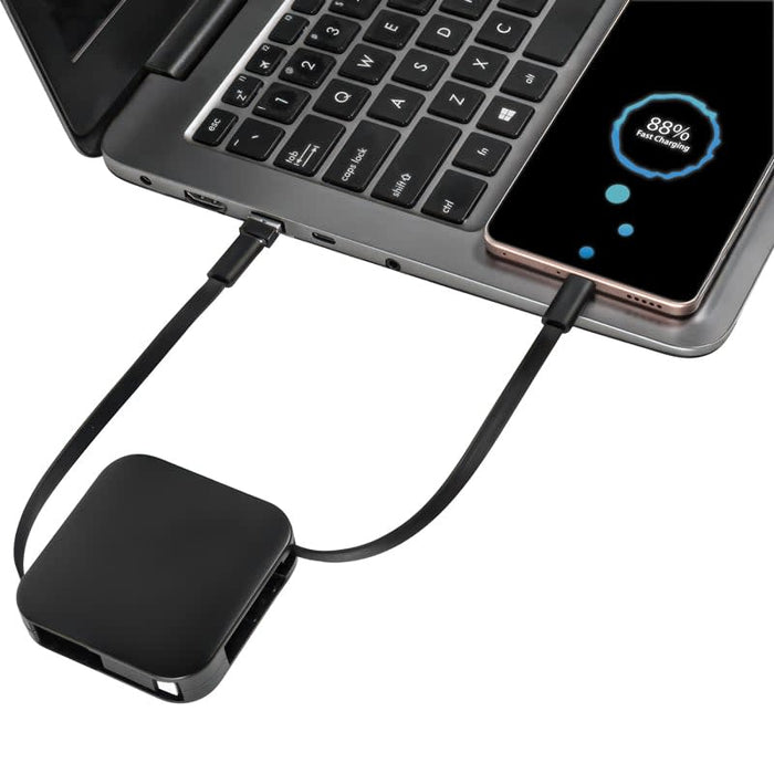 Avola Retractable Fast Charge Cable and Stand - A compact black retractable fast charge cable connected to a laptop and smartphone, featuring a sleek design.