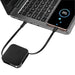Avola Retractable Fast Charge Cable and Stand - A compact black retractable fast charge cable connected to a laptop and smartphone, featuring a sleek design.