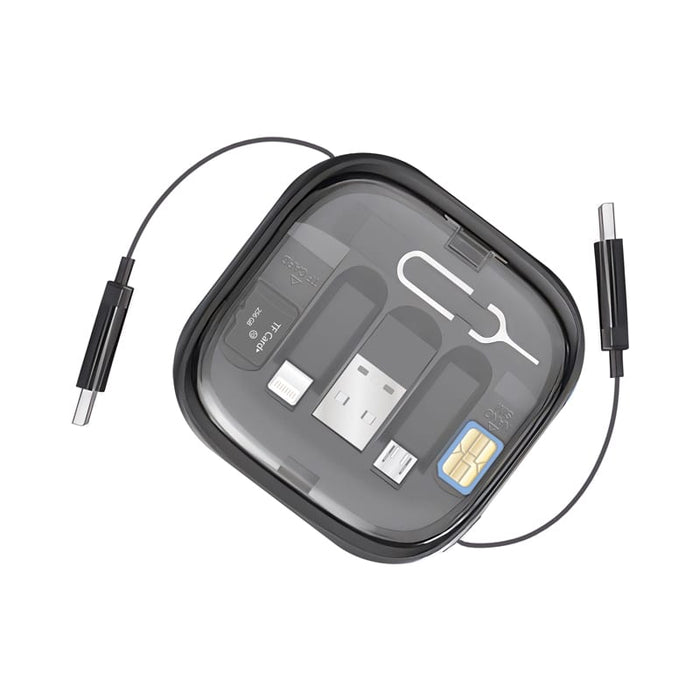 Catania Retractable 60W Fast Charging and Data Cable Set - A compact black storage case containing a retractable 60W charging and data cable set with multiple connectors.