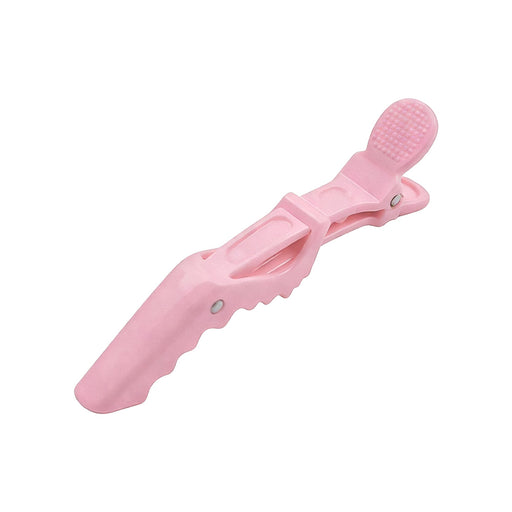 Anti-Slip Positioning Alligator Clip - A pink anti-slip positioning alligator clip with textured grip and an ergonomic design, featuring a logo on one side.