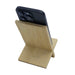 Groove Bamboo Phone Stand - A bamboo phone stand in a natural finish, holding a smartphone at an inclined angle.