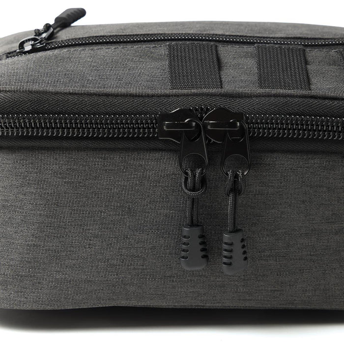 Super Duty 6 - In Pack Cooler - A cooler in dark grey fabric with a zippered closure and black pull tabs, featuring a logo.