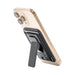 Wally Stand - A phone stand with a black holder attached to a gold smartphone, featuring a back support for stability.