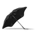 BLUNT Exec Umbrella - A black BLUNT Classic Umbrella with a unique design and a sturdy frame, featuring a logo on the handle.