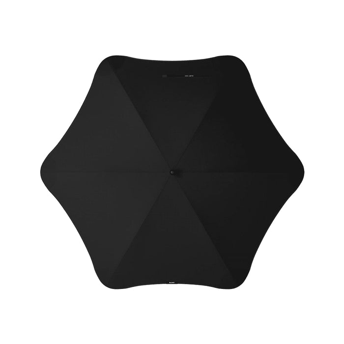 BLUNT Exec Umbrella - A black umbrella featuring a sleek, modern design with a central button and a curved silhouette.