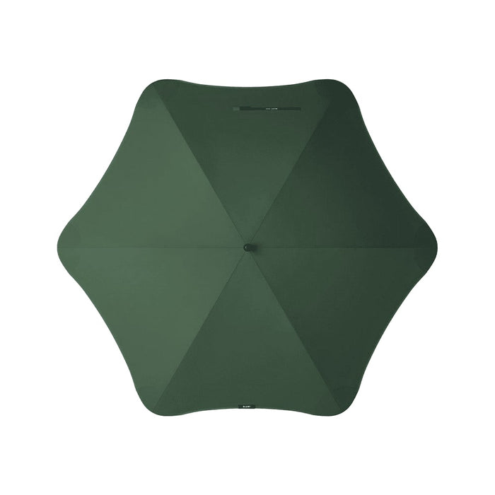 BLUNT Exec Umbrella - A green umbrella with a streamlined design, featuring a central button and a minimalist look. It has a logo on it.