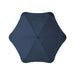 BLUNT Exec Umbrella - A dark navy umbrella with a sleek design and central button, featuring a branding logo.