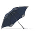 BLUNT Exec Umbrella - A navy blue umbrella with a unique shape and a sturdy pole, featuring a logo on the surface.